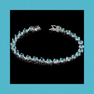 NATURAL LONDON BLUE TOPAZ HAND-SET STERL BRACELET
